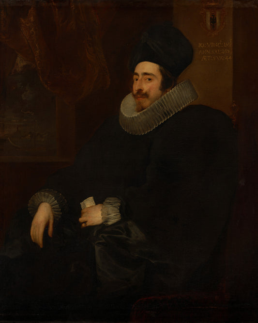 Portrait of a man in formal attire with a dark background